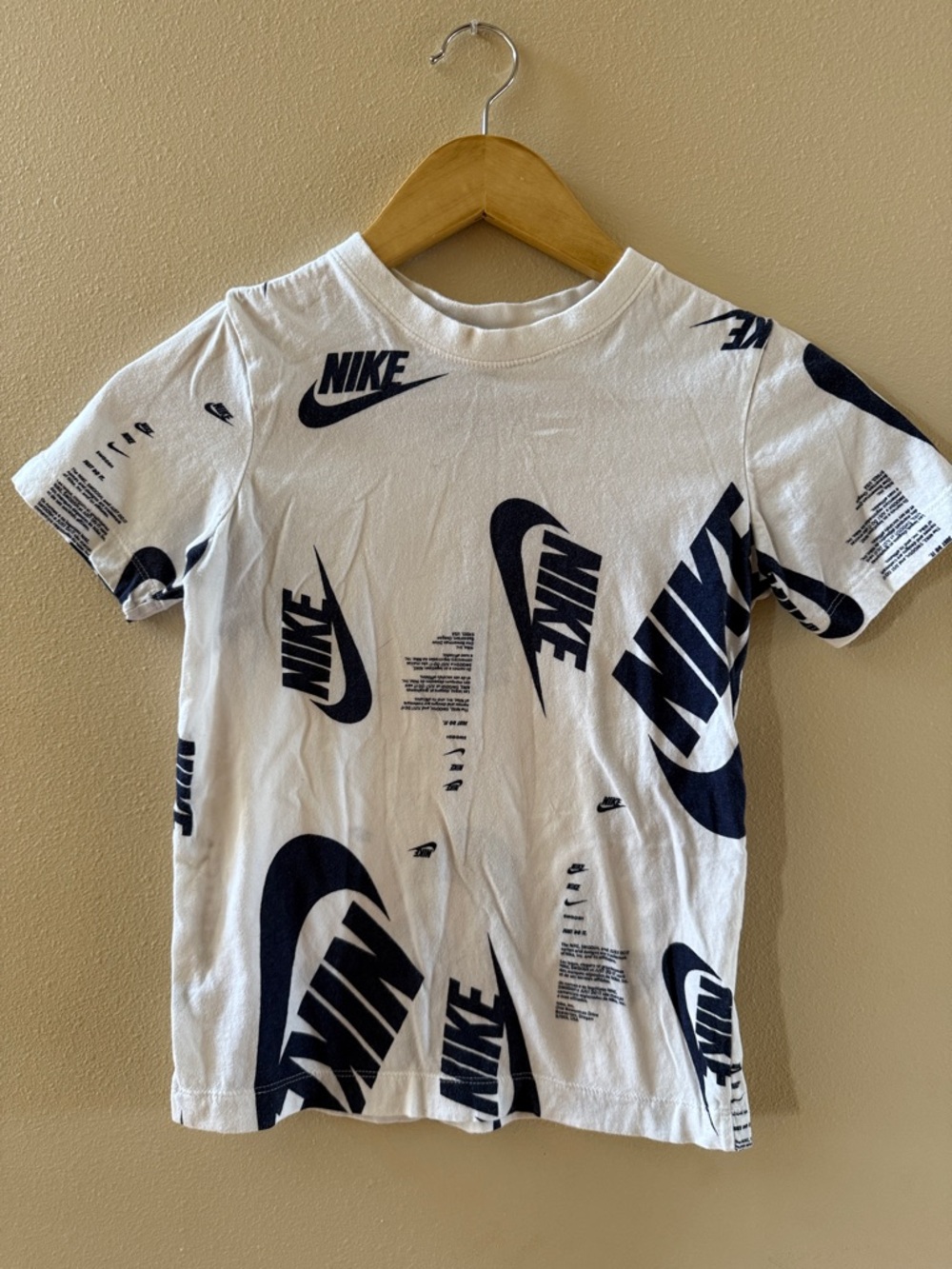 Youth Nike White Tee with Navy Logo Allover Print